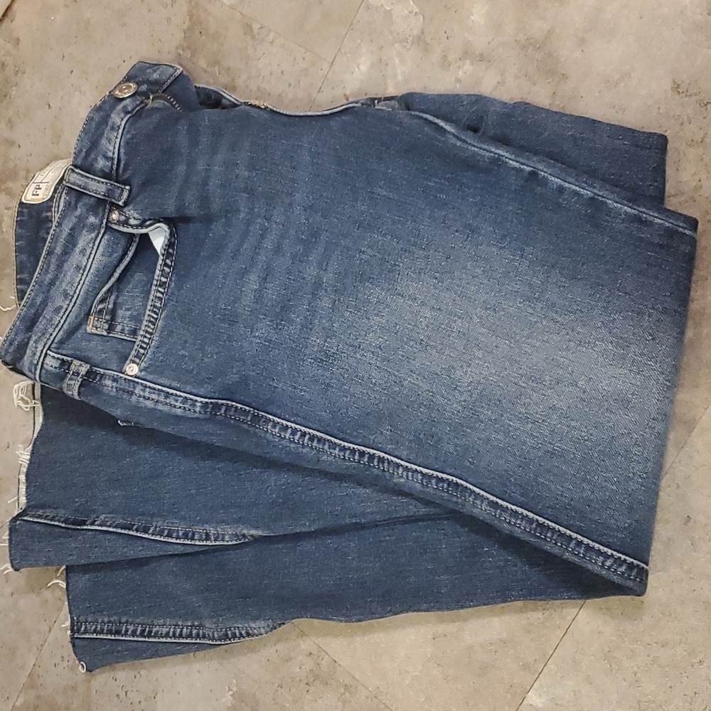 Free people frayed hem jeans.